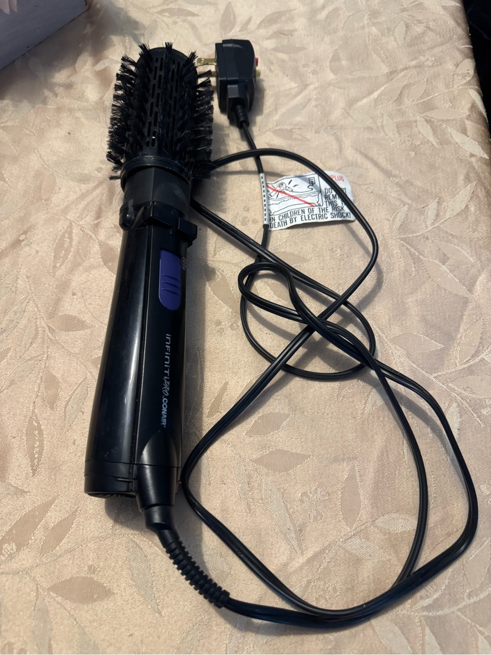 Black Rotating Hot Air Brush for Women — Sleek Volumizing Styler